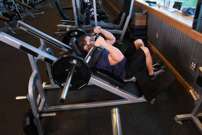 Narrow Stance Hack Squats — starting position