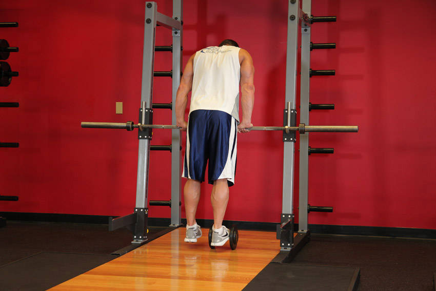 Calf Raise On A Dumbbell — start