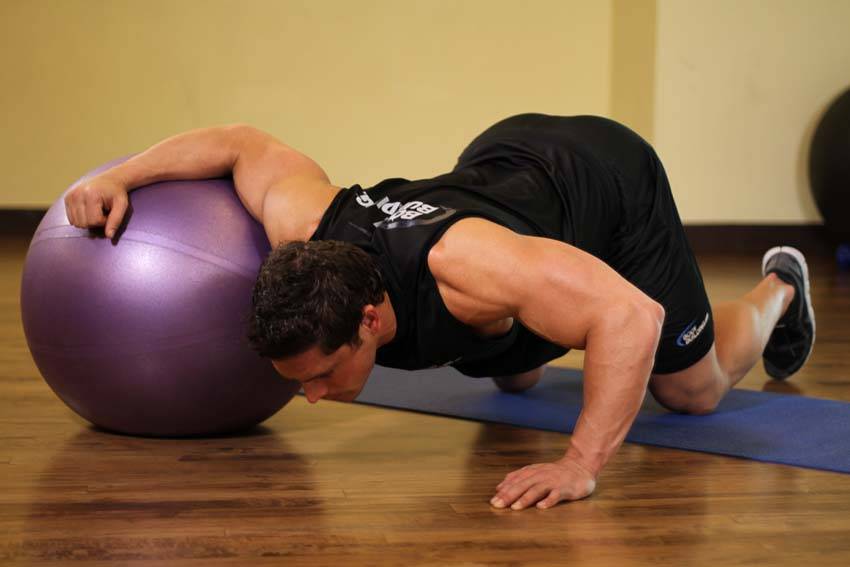 Chest Stretch on Stability Ball — start