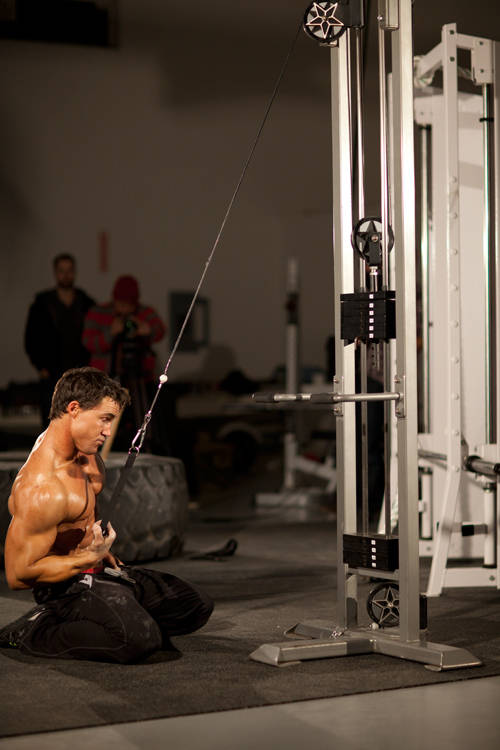 Kneeling Single-Arm High Pulley Row — end