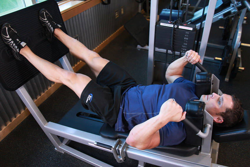 Lying Machine Squat — end