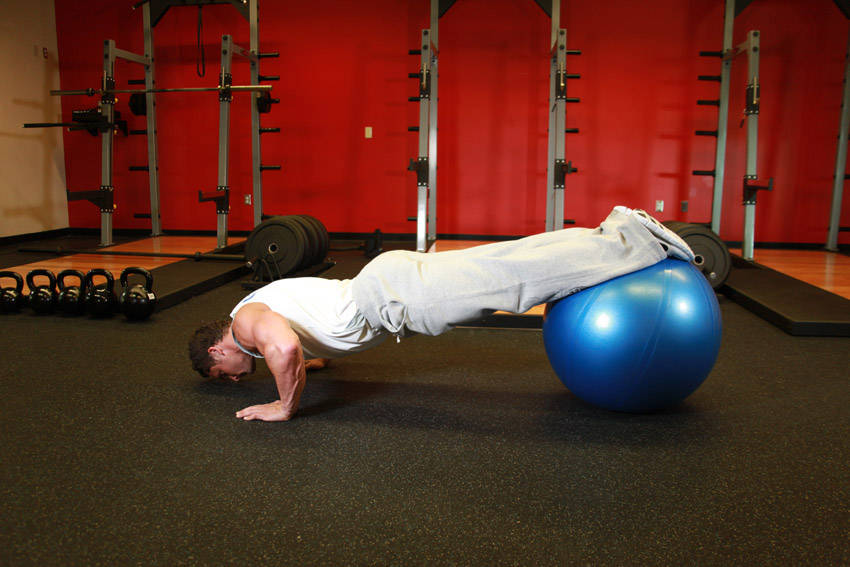 Push-Ups With Feet On An Exercise Ball — start